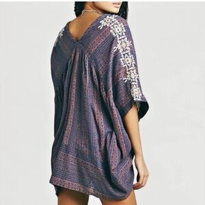 This is a Free People Tribal Beat Noyal Boho Embroidered Beaded Kaftan